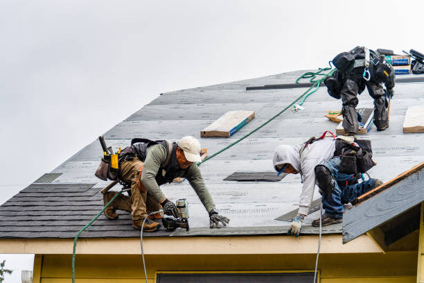 Professional Gutter Installation technician working in Beach City, TX